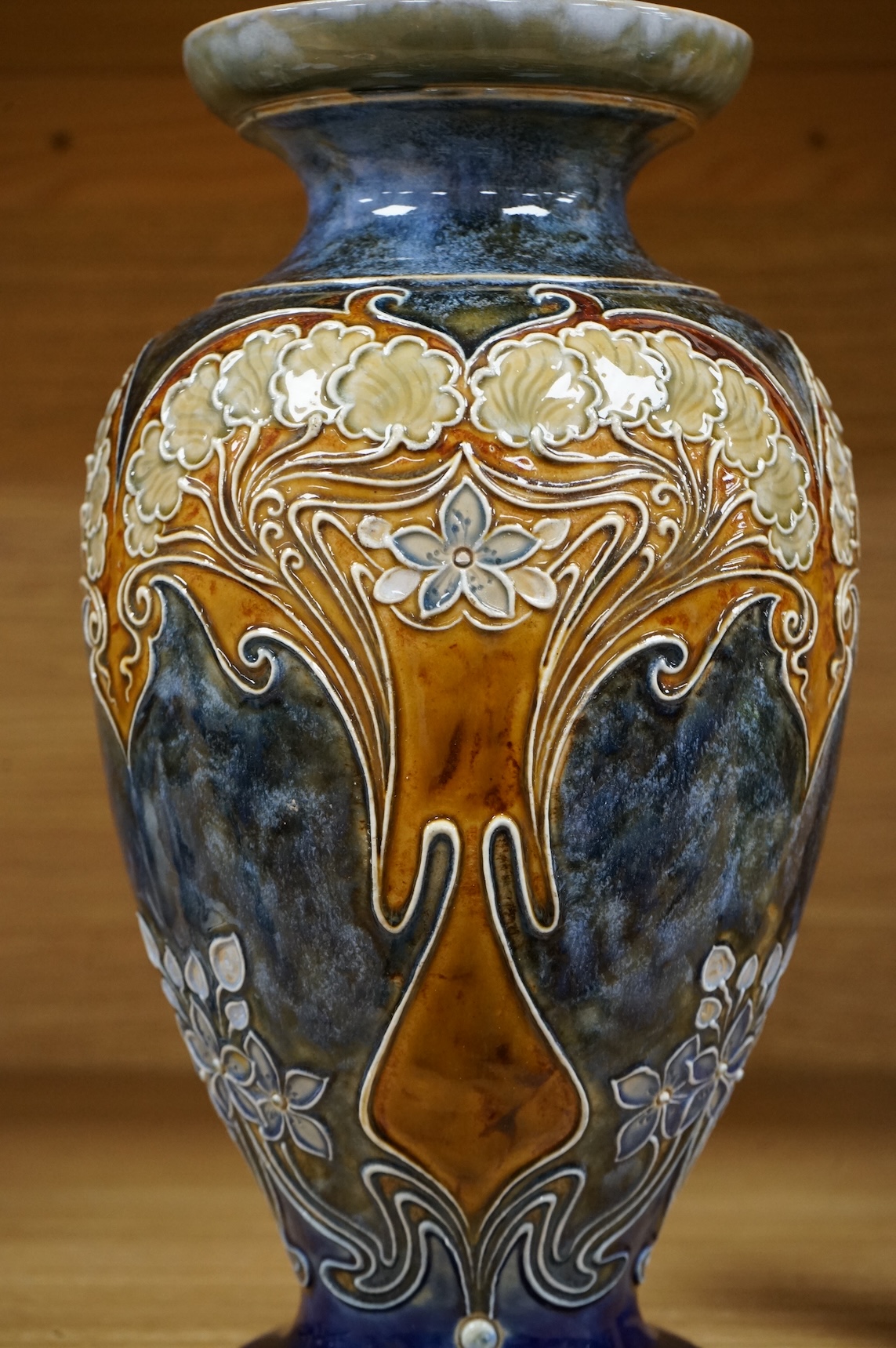 A Doulton Lambeth vase by Eliza Simmance, with repaired foot, 28cm high